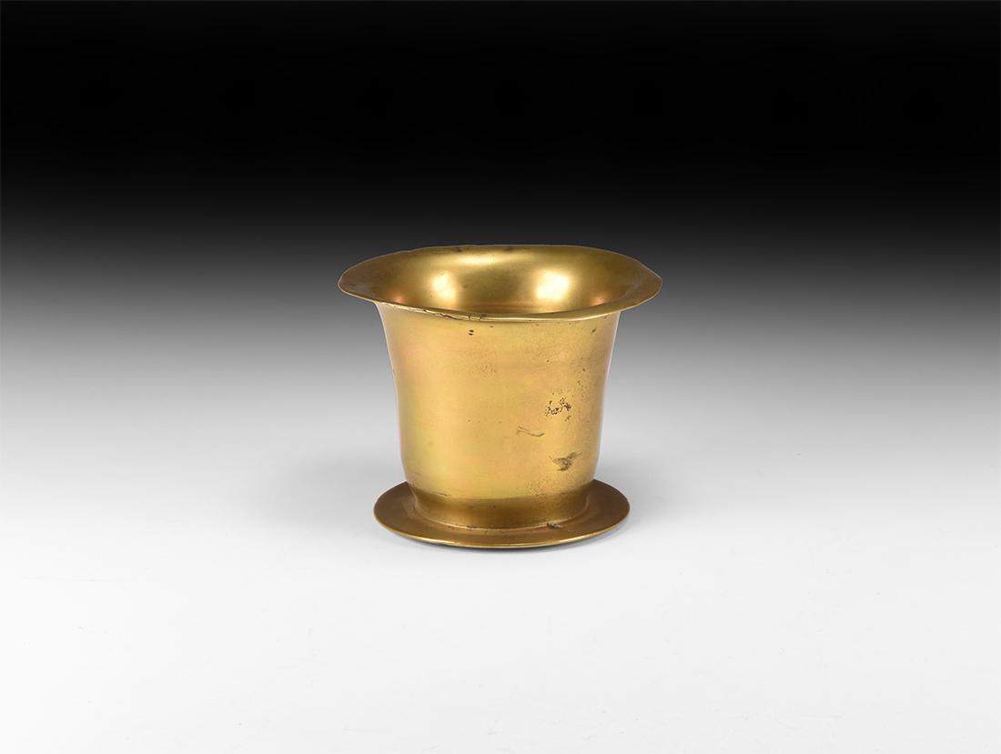 Post Medieval Tudor Brass Salter: 16th century AD. A brass bell-shaped salter with discoid base. 571 grams, 12cm (4 3/4"). Property of a Kent collector; by inheritance 1970; formerly property of Jack Smith, antiquarian and collector o