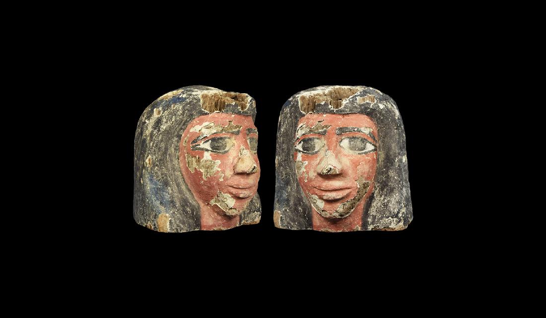 Egyptian Life-size Polychrome Statue Head: Late Period, 664-332 BC. A wooden male head with plaster and pigment over surface, from a coffin; wearing bag wig with black pigment; large eyes with painted black kohl lines and eyebrows; red pigment