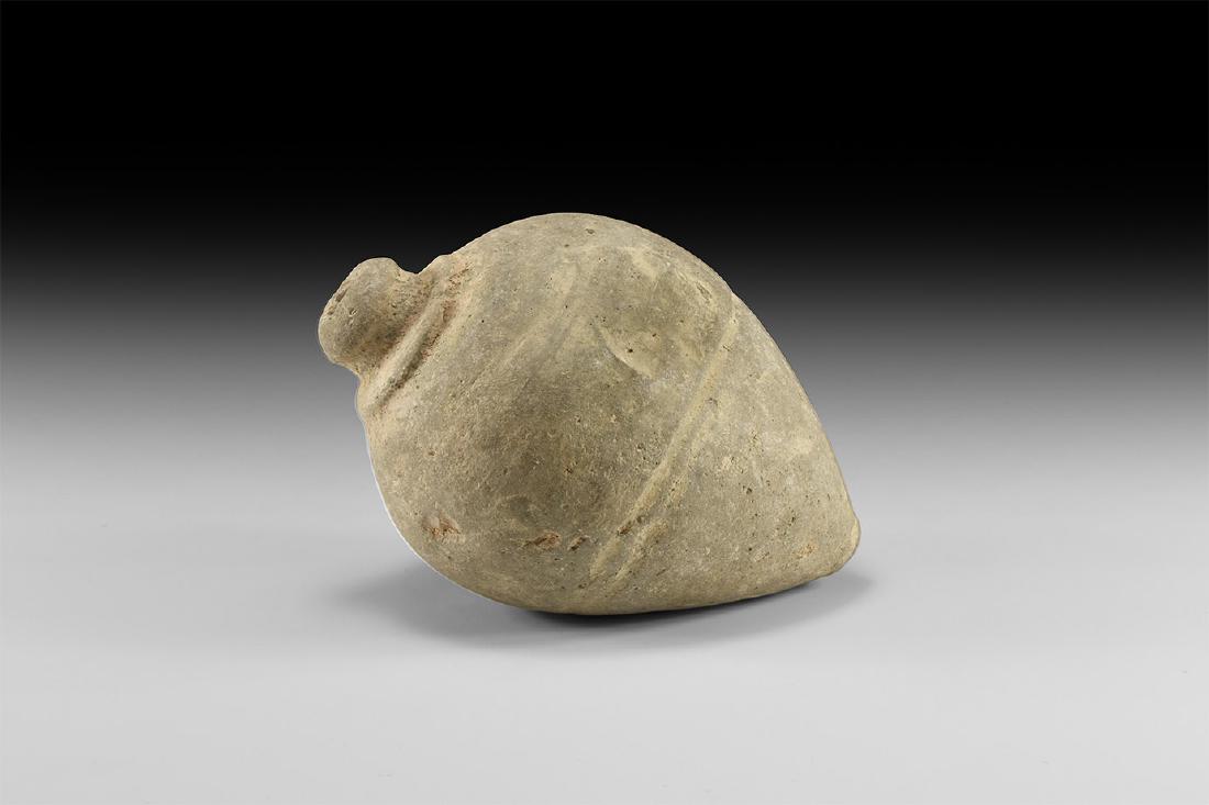 Byzantine Terracotta 'Greek Fire' Bomb: 10th century AD. A hollow-formed piriform ceramic vessel with low rim to the mouth, plain body. See Arendt W. Irene Granaten des 13-14. Jahrhunderts, die an der Wolga gefunden sind, Zeitschrift fur Hi