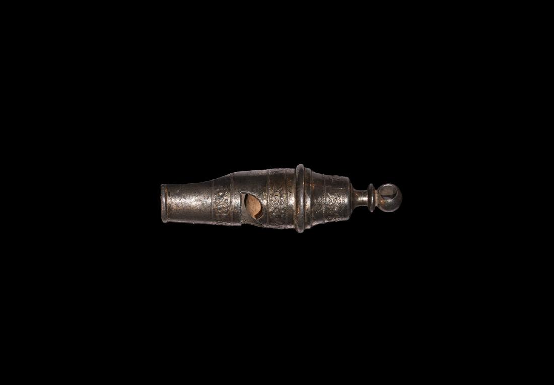 Post Medieval Hawking Whistle: 17th-18th century AD. A pewter hawking whistle with repoussÃ© scrolled tendrils to the body, barrel-shaped suspension loop. 26 grams, 68mm (2 3/4"). Property of a gentleman; acquired in the 1970s.