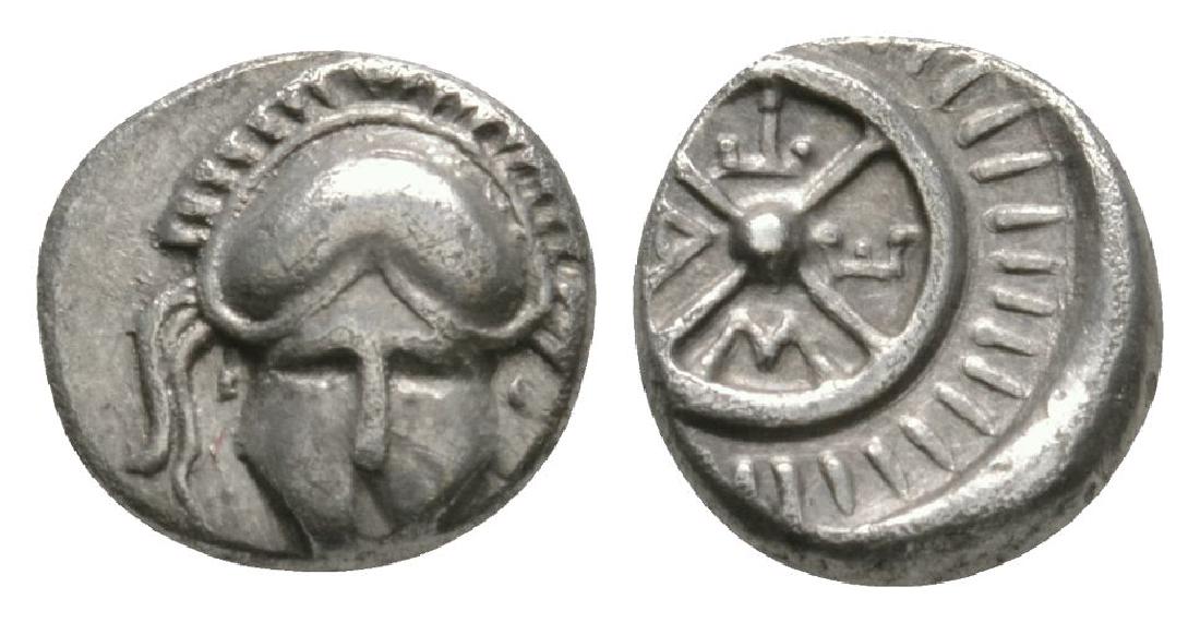 Thrace - Mesembria - Helmet and Wheel Diobol: 500-350 BC. Civic coinage. Obv: facing Corinthian helmet. Rev: META between the spokes of a radiate wheel. SNG BMC Black Sea 268 ff.; Sear 1673. 1.25 grams. .