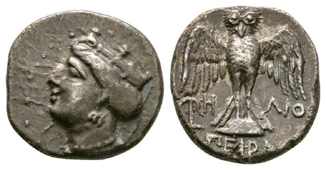 Pontus - Amisos - Tyche Drachm: 400-350 BC. Obv: head of Tyche left wearing turreted stephanos. Rev: owl standing facing on shield, wings spread with anchor and ? to left and ??? to right; ????? in exergue. BMC 7; Sear 3634 variant 