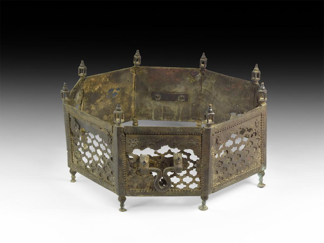 Openwork Brazier: 17th century AD. A bronze brazier of eight hinged panels with openwork facing, articulating posts with baluster feet and cage finials, retaining slots to the inner face, drop handles with beast-head s
