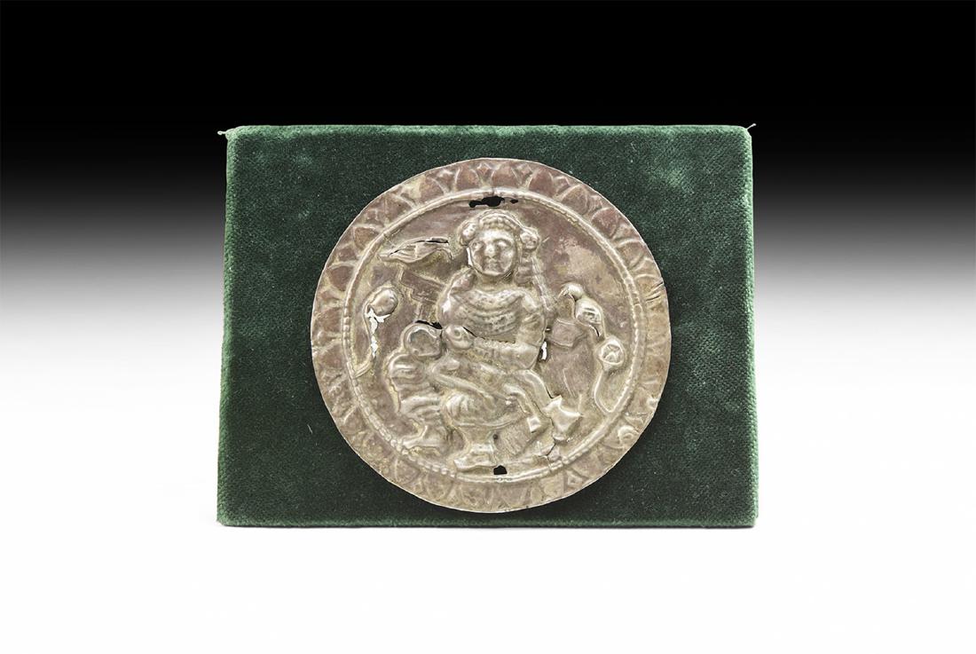 Western Asiatic Bactrian Silver Bowl Centre: 2nd-3rd century AD. A silver oval fitting decorated with repousse image of the goddess Anahita, hair arranged in bands falling to the shoulders, filet across brow with flowers to the side; long robes