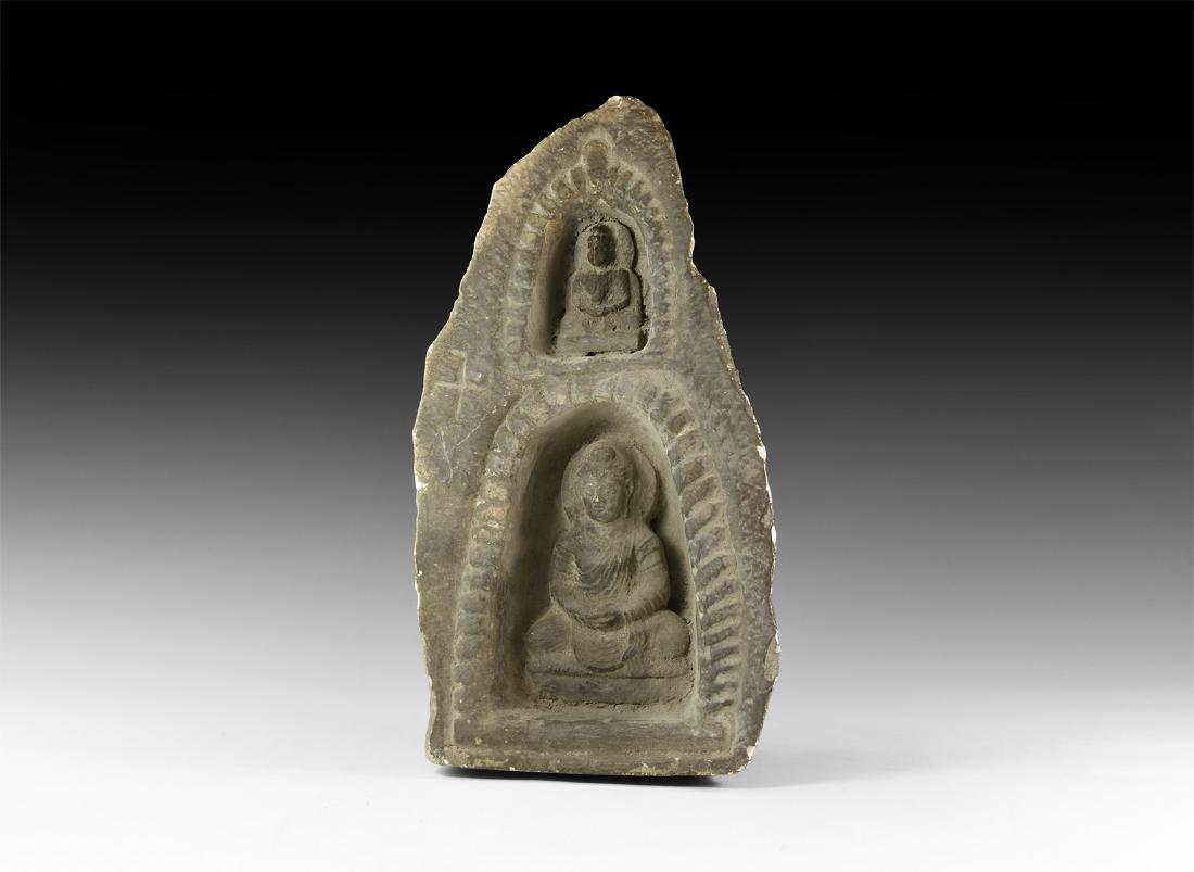 Tibetan Style Buddha Shrine Carving: An undated archaistic carved D-section stone shrine with two niches to the forward face each with an inset Buddha figurine. 5.5 kg, 31cm (12 1/2"). Property of a London gentleman; acquired before 2000