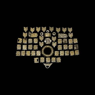 Avar Gilt Silver Belt Set: 10th-11th century AD. A group of silver-gilt belt ornaments comprising: a D-section hollow-formed hoop; a buckle with tongue-shaped plaque and reserved quadruped on a punched field; a tongue-shaped st