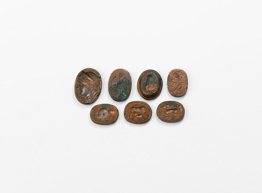Egyptian Scarab and Intaglio Electrotype Group: 19th century AD. A group of electrotypes taken from original intaglios in important collections, each with detailed record sheet and photograph(s) with full provenance and other information for the or