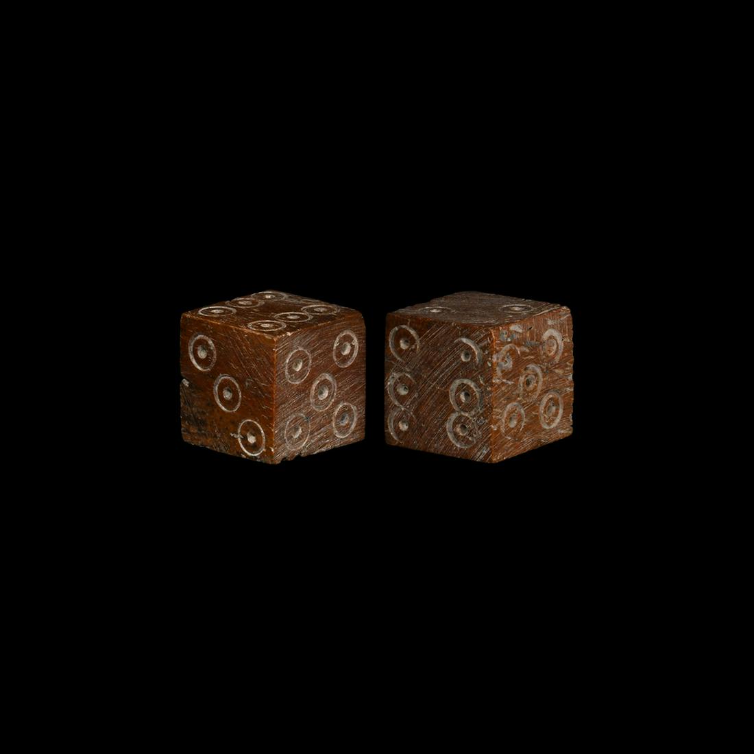 Roman Bone Dice Pair: 1st-2nd century AD. A substantial pair of cuboid bone dice with ring and-dot marks disposed 1:6, 2:3, 4:5. 8.2 grams total, 13mm each (1/4"). Property of a south London collector; acquired before 1980