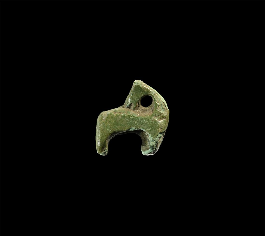 Viking Horse Amulet: 10th-12th century AD. A bronze amuletic pendant of a horse with neck arched and head reversed. 5.5 grams, 17mm (3/4"). From a London W1, UK, collection; acquired on the German art market before 2000. 