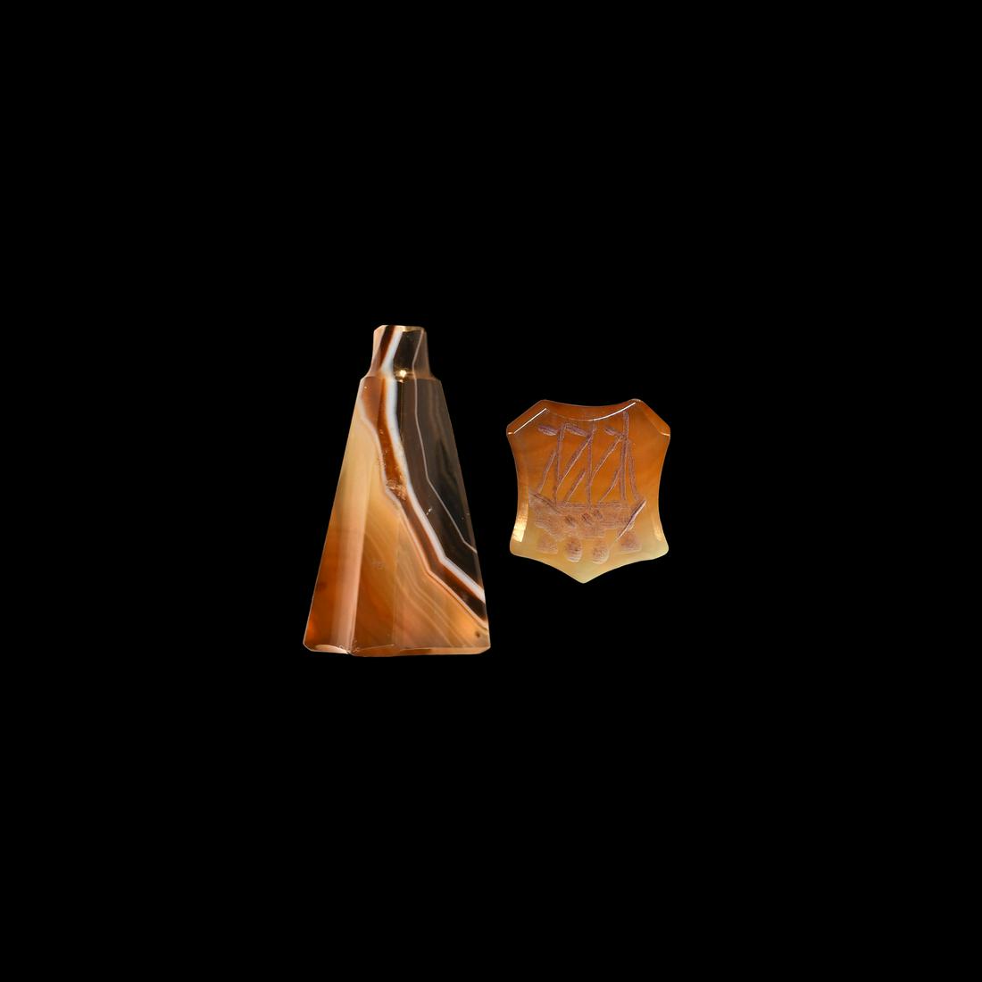 Banded Agate Stamp Seal with Three-Masted Ship: 18th century AD. A pyramidal banded agate seal with knop finial, intaglio to the underside of a three-masted ship. 1.64 grams, 18mm (1/2"). From an East London collector; previously in a collection fo