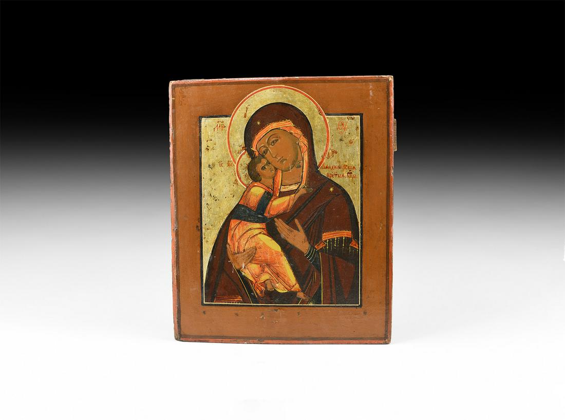Russian Icon with Mary and Jesus: 19th century AD. A rectangular icon painted in tempera on a wooden panel with mounting slots to the reverse, depicting Mary Theotokos holding the infant Jesus, both nimbate, in a bilinear frame. See W