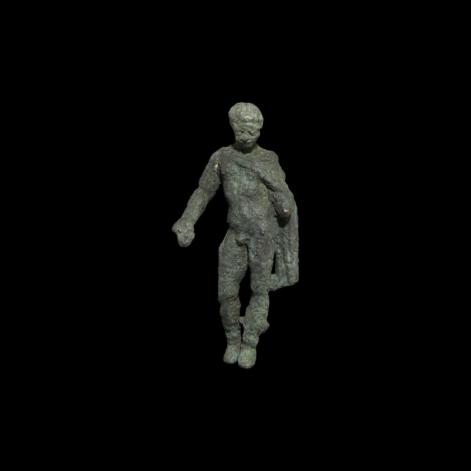 Roman Apollo Statuette: 1st century BC-1st century AD. A bronze figure of Apollo standing nude with mantle wound around the left arm, right arm extended, head inclined downwards, wearing calf-length boots or sandals. Cf. Rol