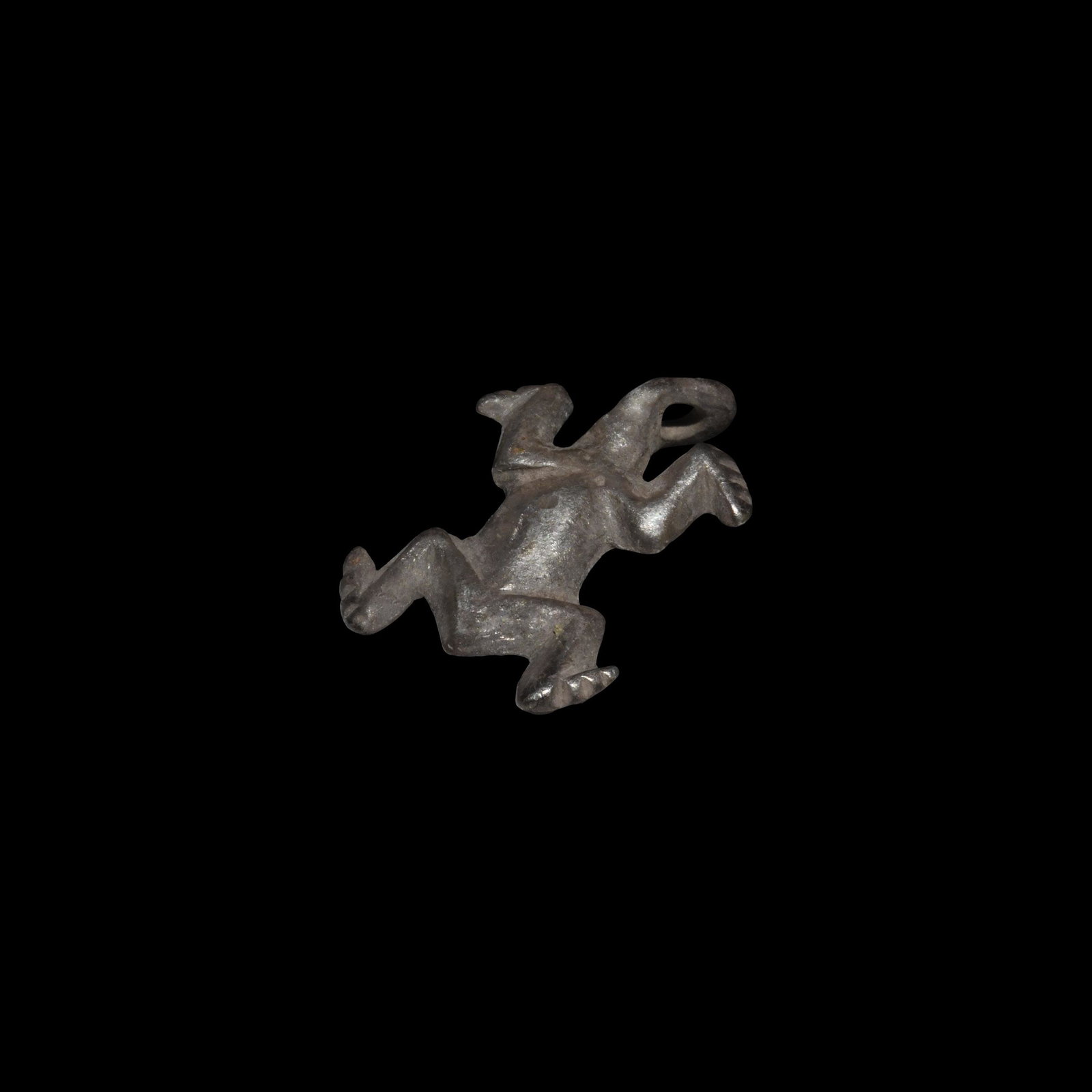 Roman Silver Frog Pendant: 1st-2nd century AD. A silver pendant frog with integral loop. 2.43 grams, 22mm (3/4"). Property of a Dutch gentleman; formerly in an old collection formed in the 1970s. [No Reserve]