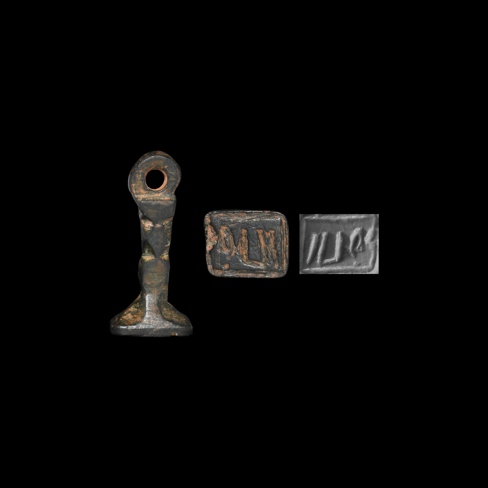 Western Asiatic Aramaic Stamp Seal: 1st-3rd century AD. A bronze stamp seal comprising a square base and balustered shank with pierced lug, intaglio Palmyrene(?) or Nabataean inscription. 6.8 grams, 28mm (1"). Property of a London gentl