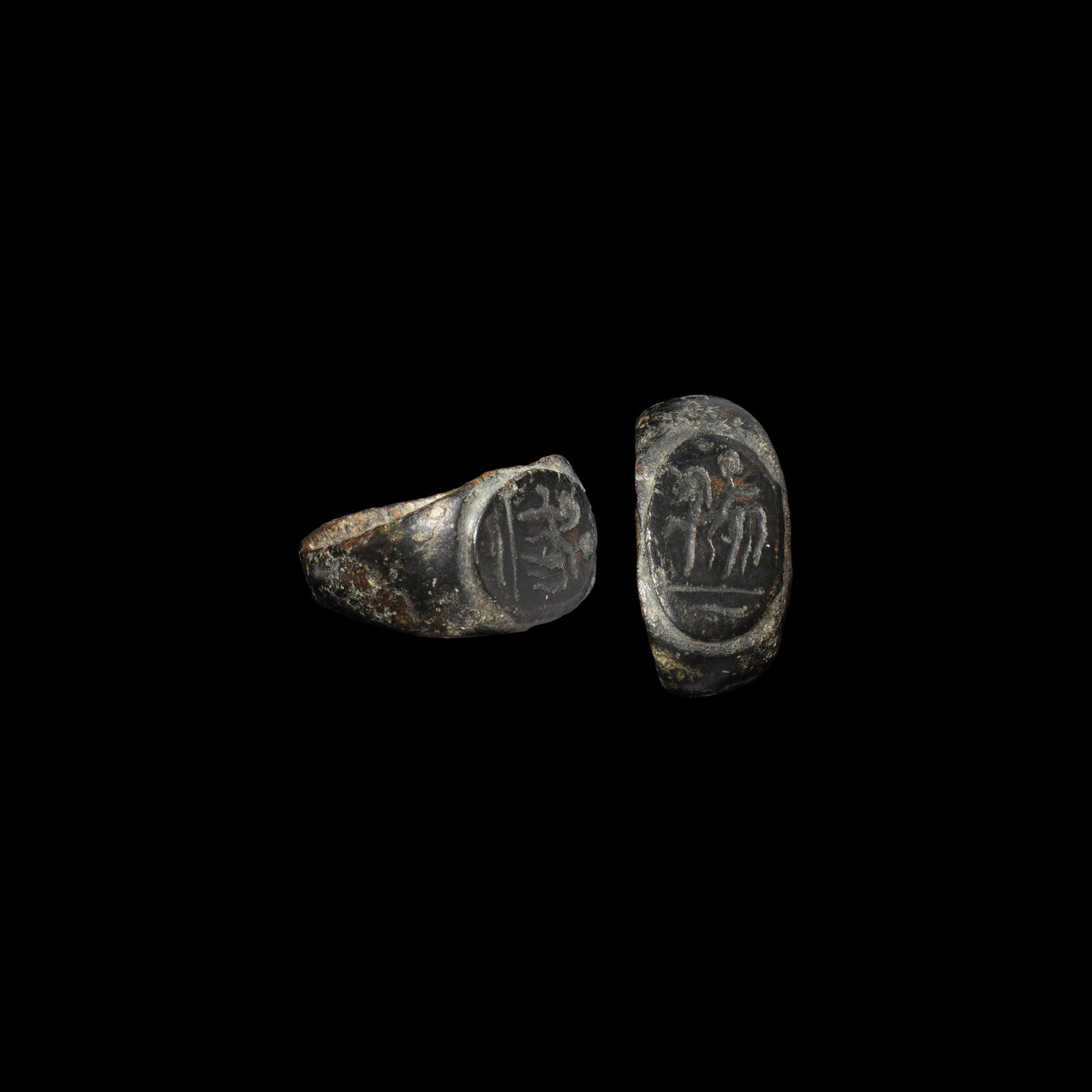 Roman Ring with Cavalryman: 2nd-3rd century AD. A bronze ring with the intaglio of a cavalryman. 5.6 grams, 21.20mm overall, 16.12mm internal diameter (approximate size British H, USA 3 3/4, Europe 6.18, Japan 6) (3/4"). Propert