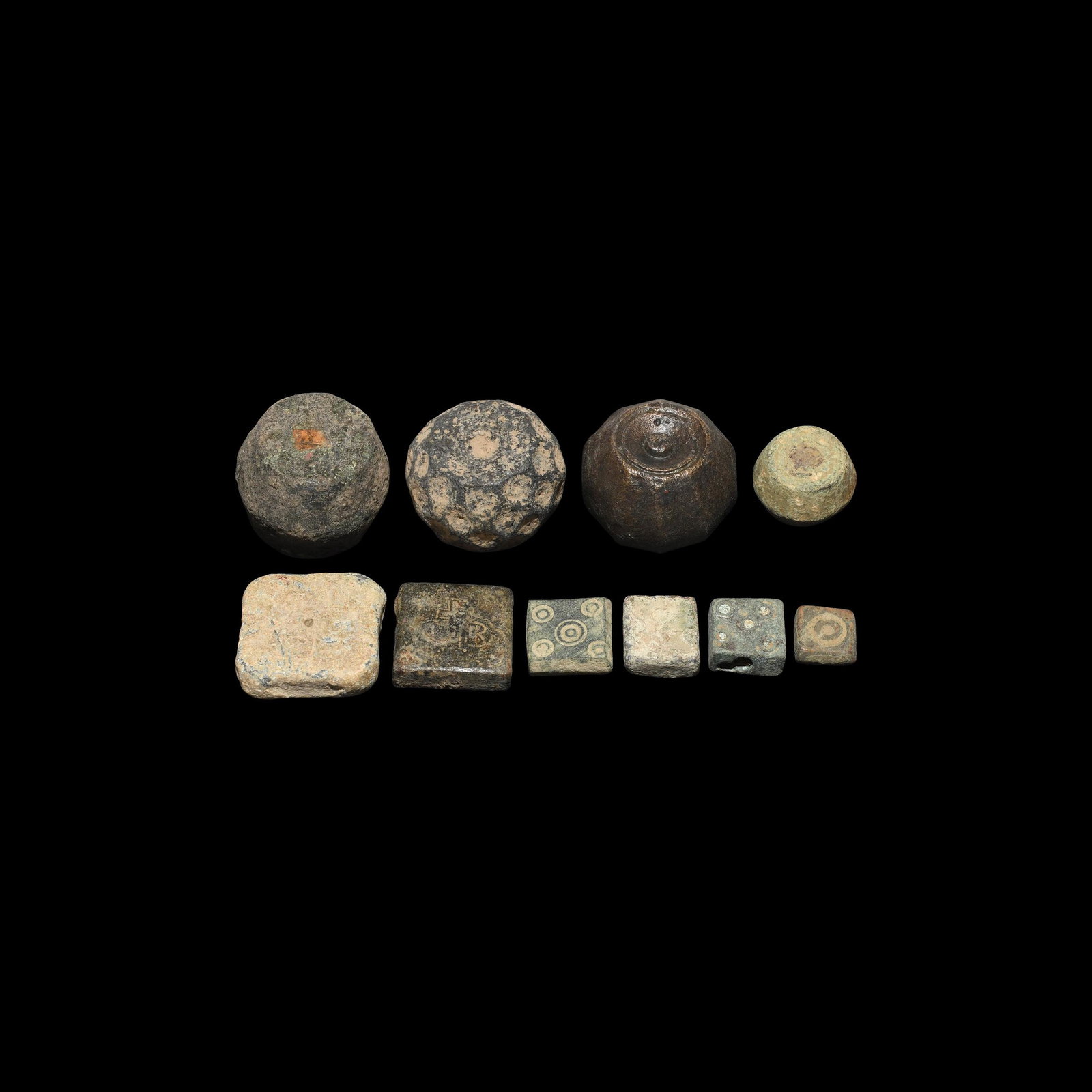 Byzantine Weight Collection: Mainly 10th century AD. A mixed group of bronze and lead-alloy trade weights including barrel-shaped and tabular types. 248 grams total, 8-24mm (1/4 - 1"). From a private Netherlands collection; previ