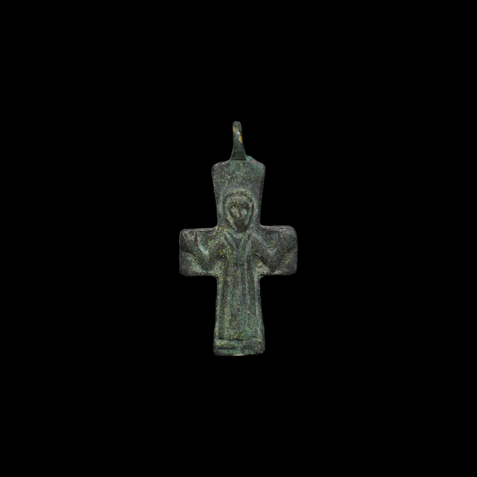 Byzantine Cross Pendant: 11th-12th century AD. A bronze cross pendant with the image of a praying saint in tunica talaris in orans pose. 3.33 grams, 38mm (1 1/2"). Property of a South London collector; acquired before 1980. [