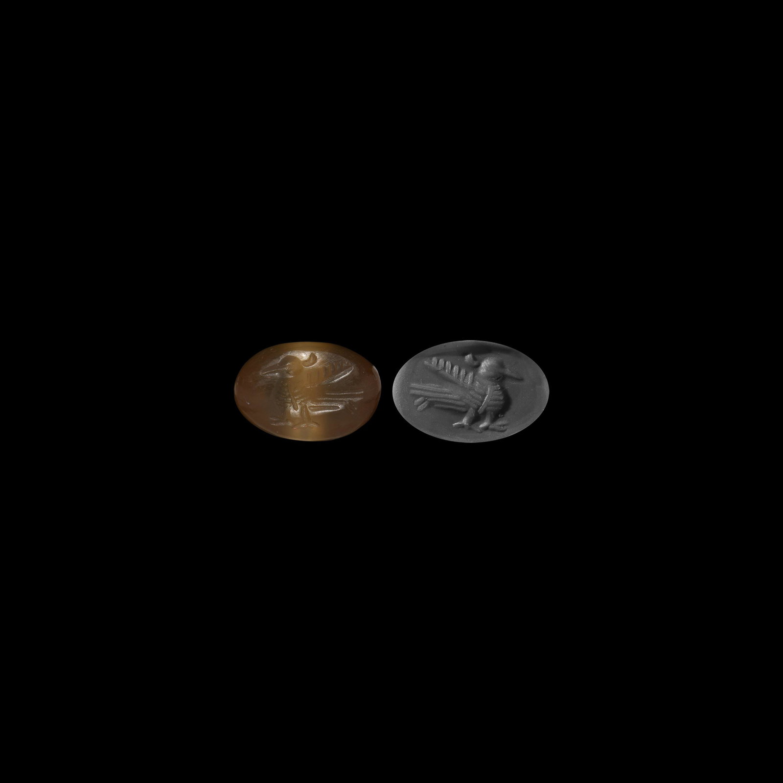 Sassanian Stamp Seal with Bird: 3rd-7th century AD. A keeled carnelian stamp seal with intaglio standing bird motif; accompanied by a museum-quality impression. 4.15 grams, 18mm (3/4"). Property of a London lady; from her family col
