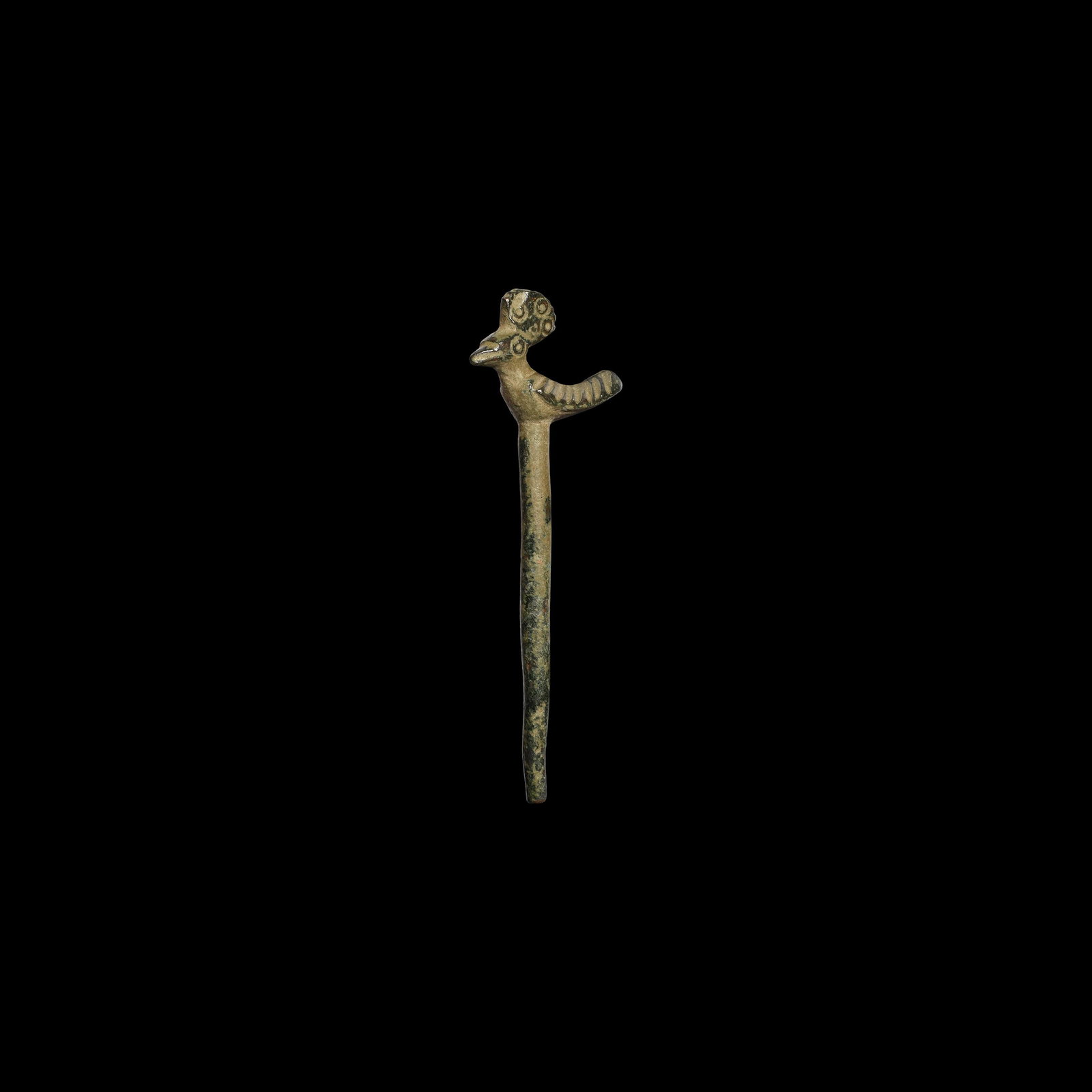 Bird-Headed Pin: 1st millennium BC. A bronze dress pin with bird finial, herringbone feather detailing and triangular comb. 13.9 grams, 77mm (3"). From a private Netherlands collection; previously in an old collection
