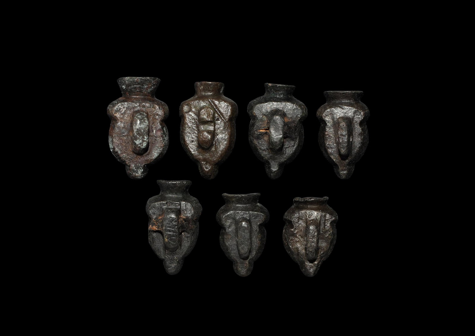 Post Medieval Musket Ball Mould Collection: 17th century AD. A group of seven musket ball moulds with locating lugs and sockets to the inner face, loops to the outer faces. 106 grams total, 24-31mm (1 - 1 1/4"). Property of a South London colle