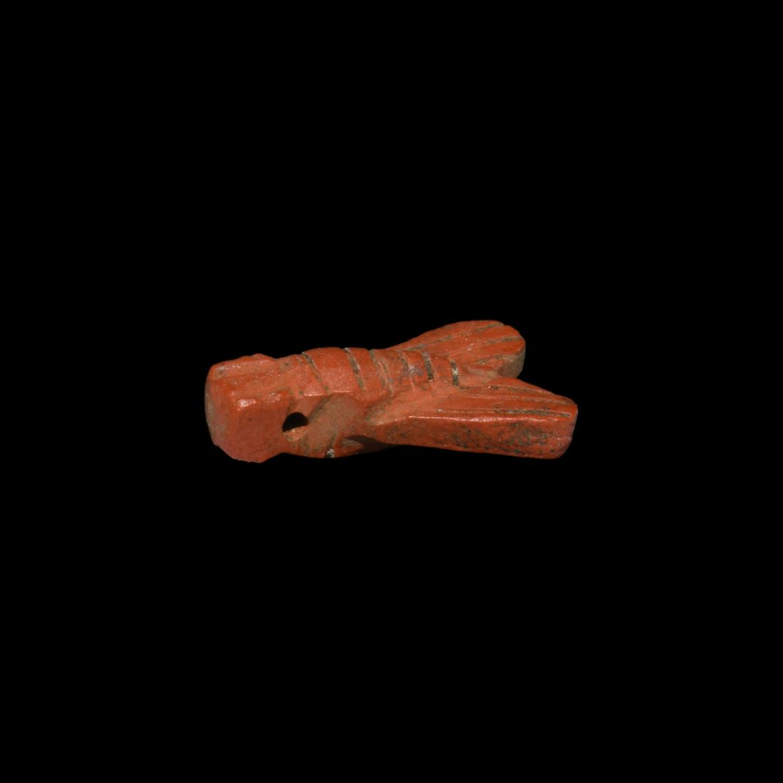 Egyptian Jasper Fly Amulet: New Kingdom, 1550-1070 BC. A carved jasper amuletic fly pendant with incised line detailing to both sides, pierced for suspension. Cf. Andrews, C. Amulets of Ancient Egypt, London, 1994, p.62. 0.41 gr