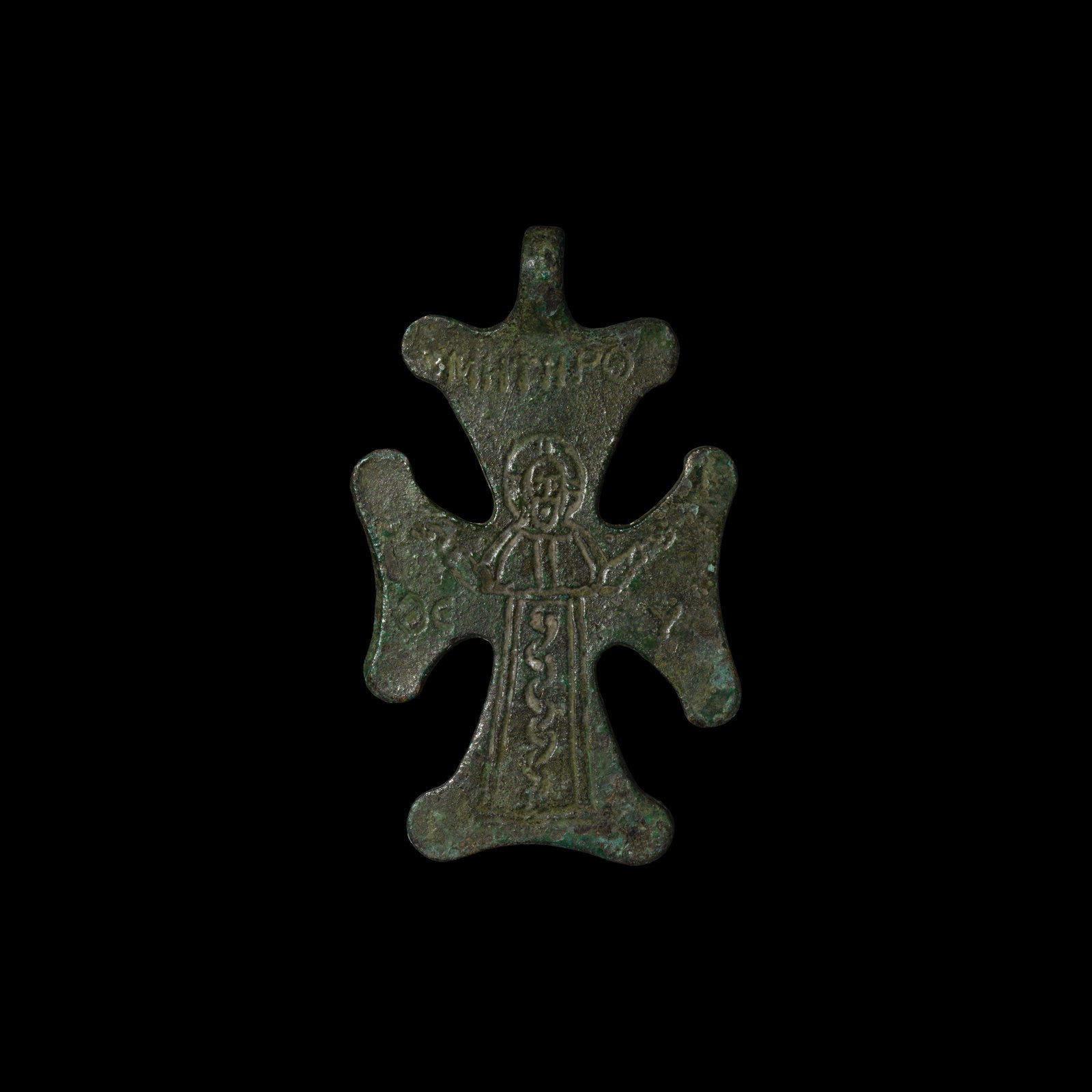 Byzantine Cross Pendant with Saint: 10th-12th century AD. A large bronze cross pendant with incised image of nimbate, robed figure in orans pose, 'MHTHP?' above and '??' and 'Y' below the arms. 26.8 grams, 66mm (2 1/2"). Property of a N