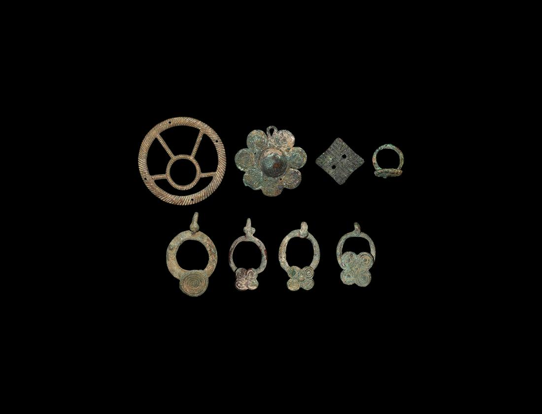Western Asiatic Artefact Group: 3rd-2nd millennium BC. A mixed group of bronze items including one lozenge stamp seal accompanied by an old scholarly note, typed and signed by W.G. Lambert, late Professor of Assyriology, University 