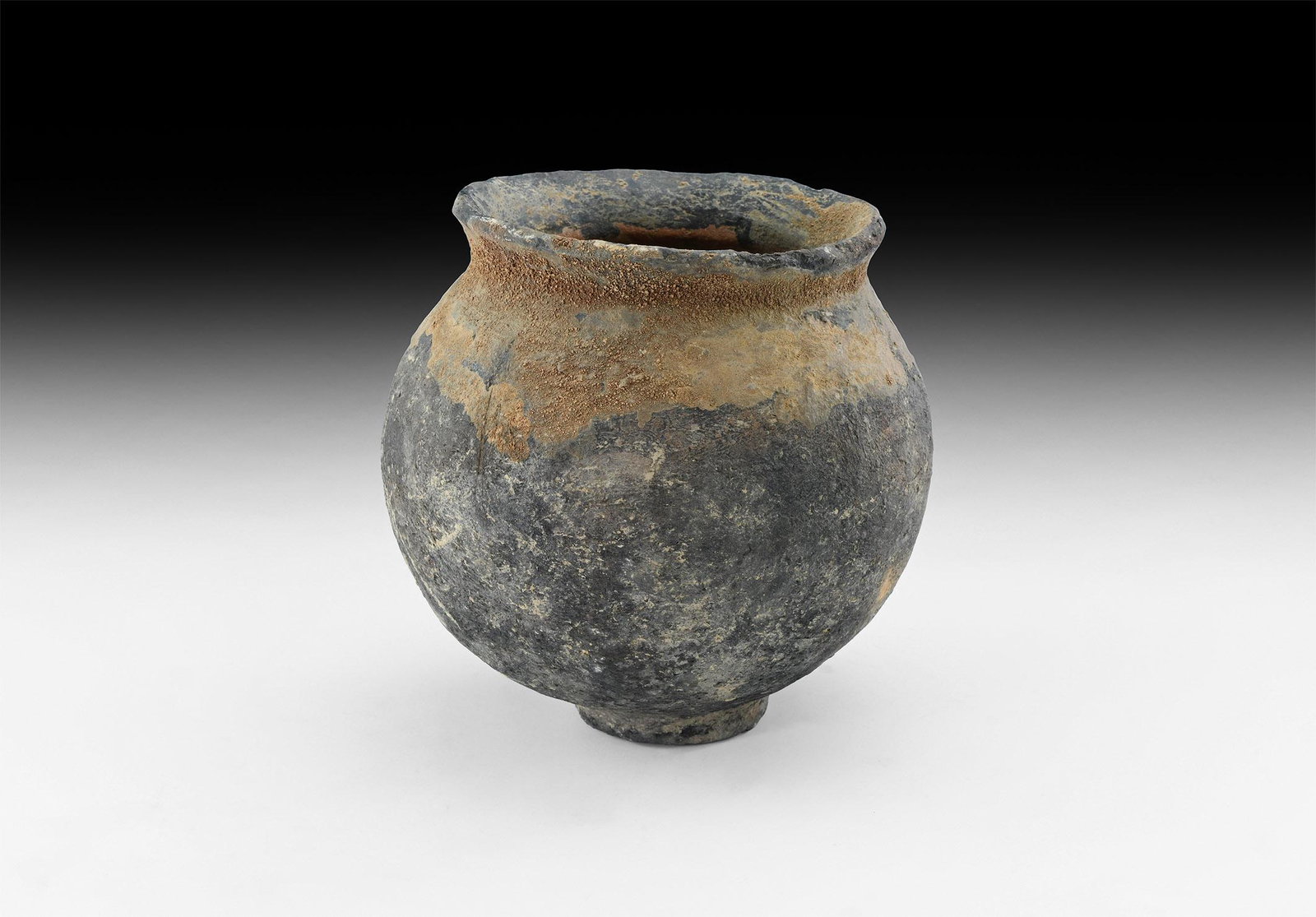 Bronze Age Storage Vessel: 3rd-2nd millennium BC. A ceramic storage jar with bulbous body, flared rim. 1.4 kg, 19.5cm (7 3/4"). From the property of a London gentleman; previously in the private collection of the late David Gol