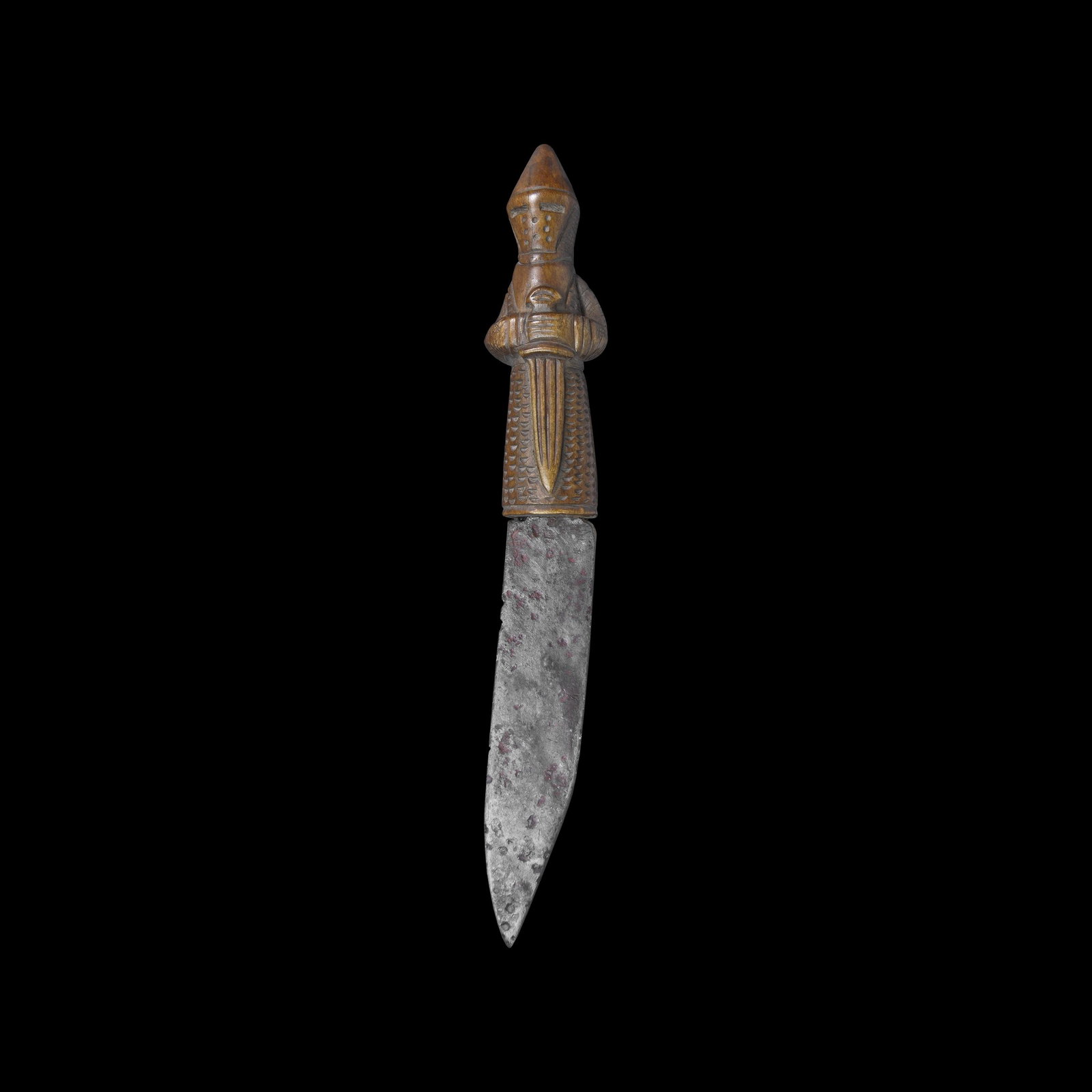 Medieval Knife with Crusader Knight Handle: 12th-14th century AD. An iron single-edged knife blade with broad back and curved profile; with carved modern antler handle in the form of a crusader knight. 58 grams, 18cm (7"). Private collection, U