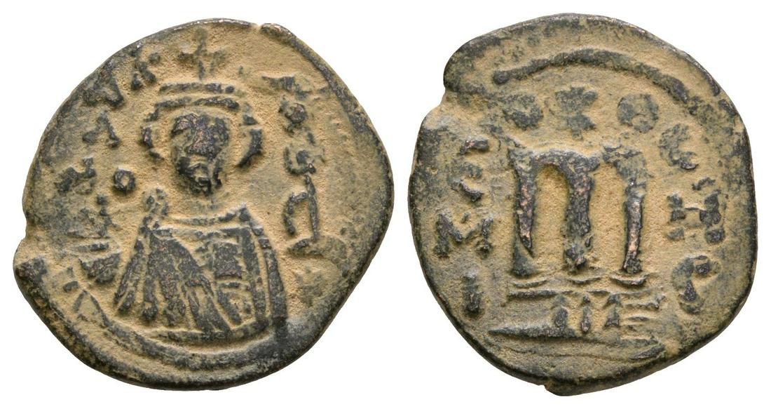 Arab-Byzantine - Facing Bust Fals: 7th-9th century AD. Obv: facing bust with inscription. Rev: large M with E / M / I left and C / H / C right; mintmark in exergue. See Wilkes 1, 133. 3.93 grams. ("). [No Reserve]
