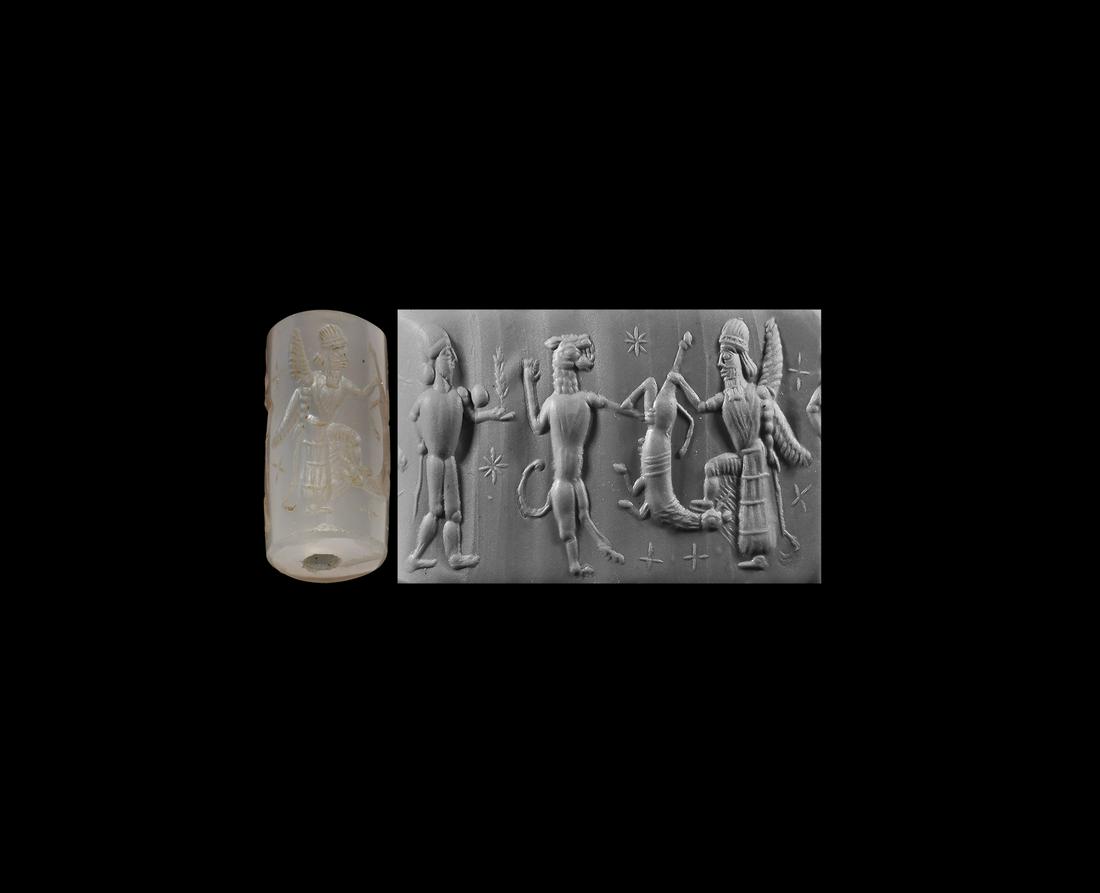 Neo-Babylonian Cylinder Seal with Contest Scene: 800-539 BC. A chalcedony(?) cylinder seal, accompanied by a museum-quality impression and a scholarly note, which states: 'A winged bearded hero, facing left, with long neck hair, wearing a tall domed