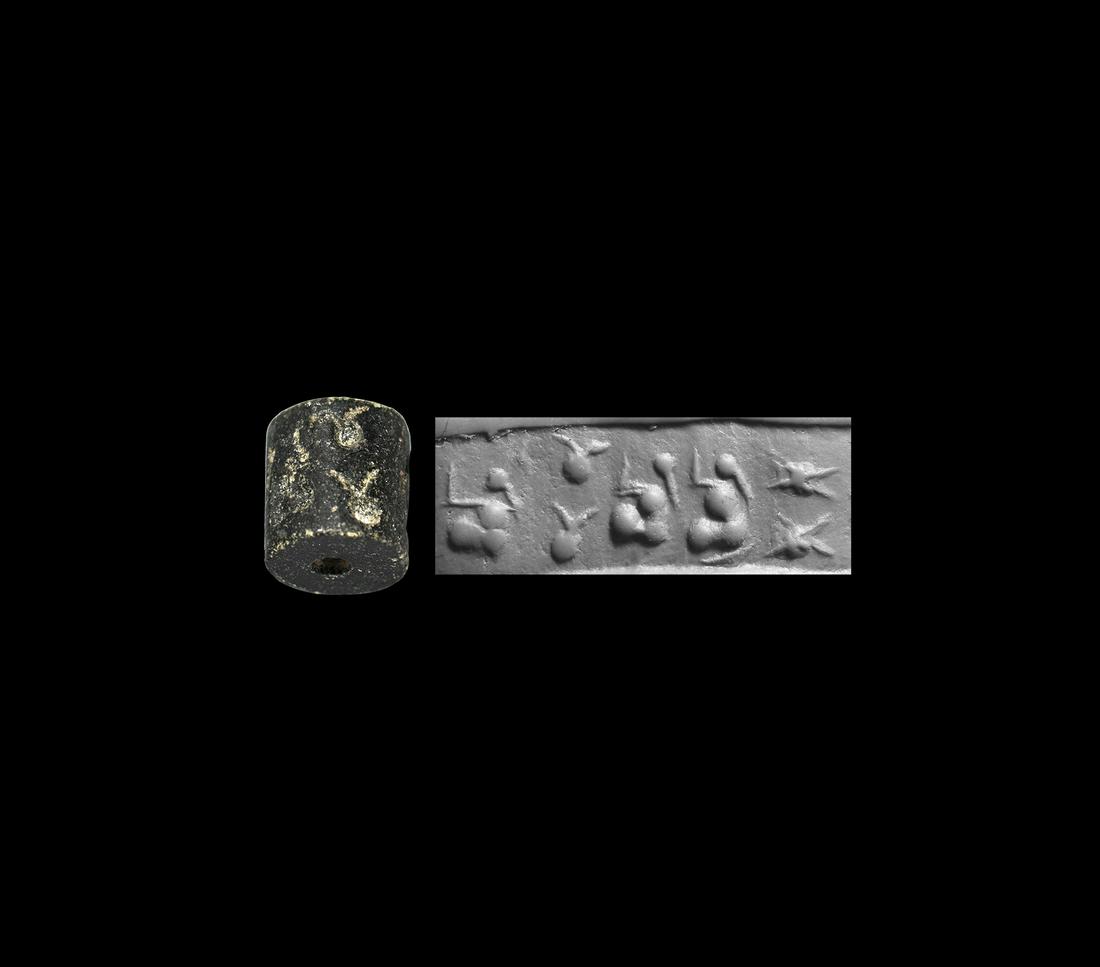 Diyale Valley Cylinder Seal with Female Figures: Late 4th-early 3rd millennium BC. A jasper cylinder seal with figure group; accompanied by a museum-quality impression and typed and signed scholarly note issued by W.G. Lambert, Professor of Assyriol