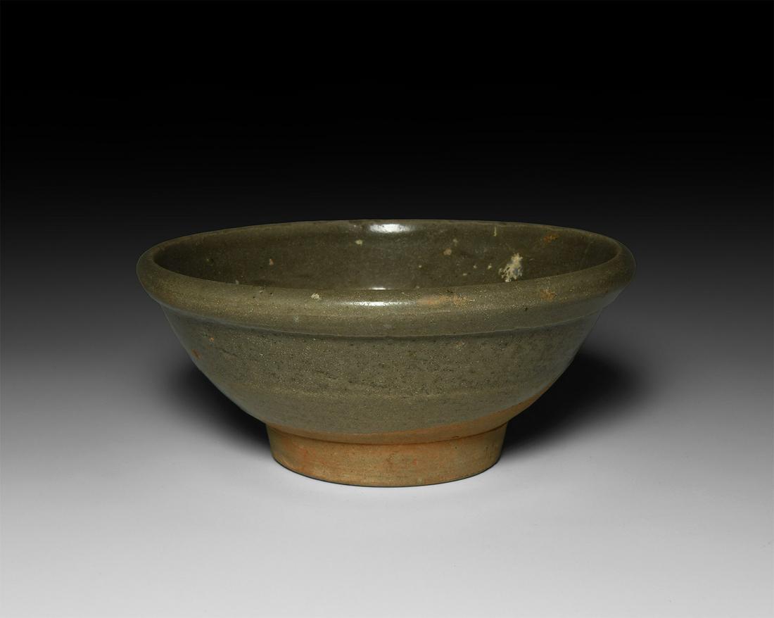 Chinese Ming Glazed Footed Bowl: Ming Dynasty, 1368-1644 AD. A part-glazed ceramic bowl with convex body, bevelled rim and plinth foot. 358 grams, 14cm (5 1/2"). From a specialist collection of Oriental ceramics, formed by a late Jap