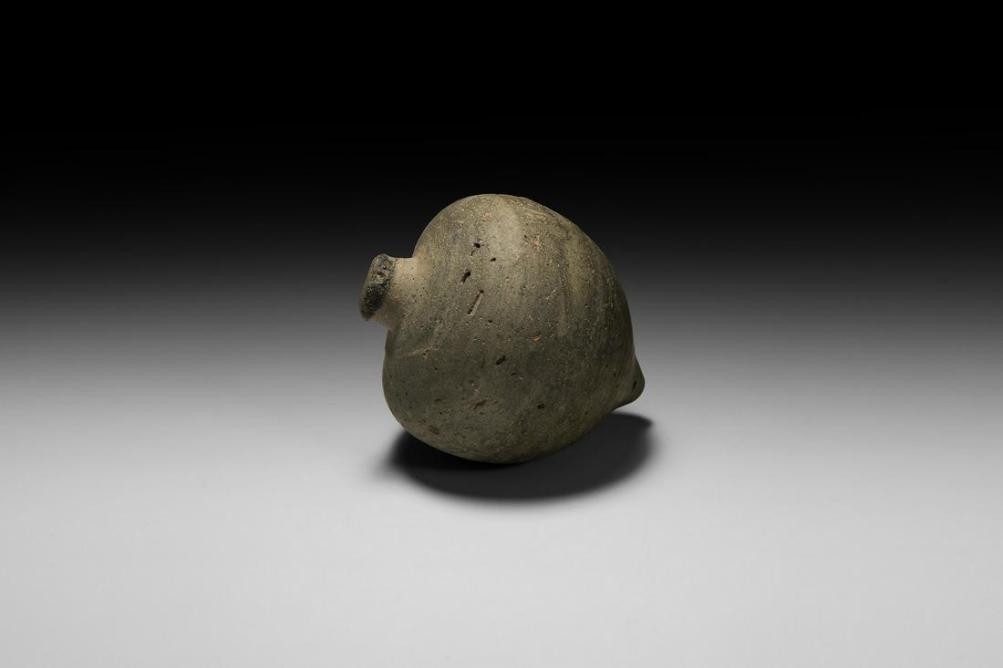 'Greek Fire' Fire Bomb or Hand Grenade: 9th-11th century AD. A ceramic piriform vessel with domed top and conical base, intended to be filled with explosive liquid and wick and used as a hand grenade. Cf. Arendt, W. I., Granaten des 13-14.