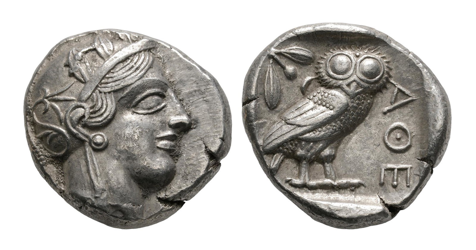 Attica - Athens - Owl Tetradrachm: 450-405 BC. Obv: helmetted head of Athena right. Rev: owl standing right; olive branch and crescent behind, A?E before, within incuse square. Sear 2526. 17.17 grams. ("). Property of a London gentlema