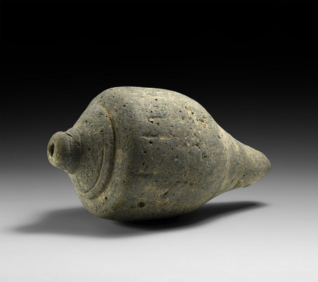 Byzantine 'Greek Fire' Fire Bomb or Hand Grenade: 9th-11th century AD. A tall ceramic carinated piriform vessel with shallow rim and broad shoulder decorated with a circumferential band, intended to be filled with explosive liquid and wick and used a