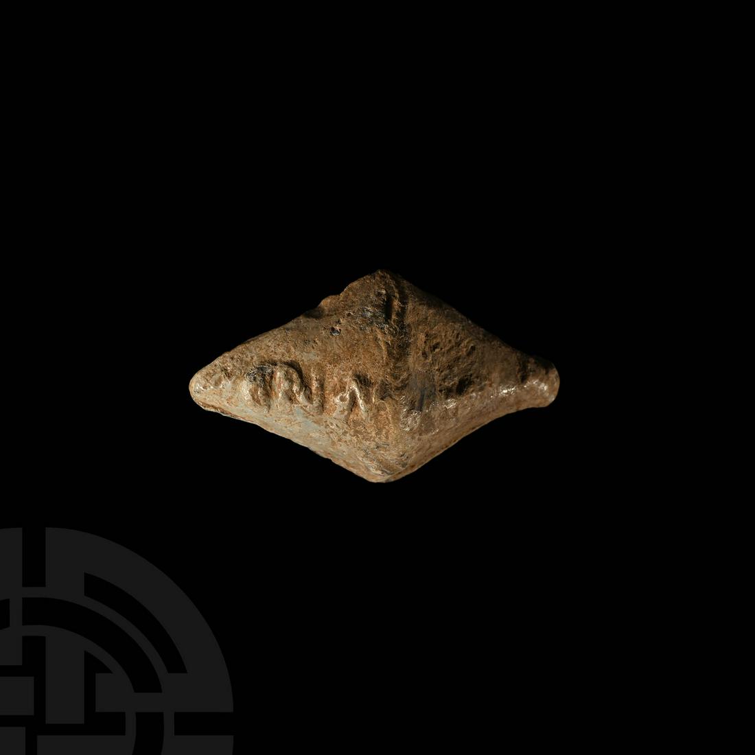 Roman Cnaeus Pompey Slingshot: 1st century BC. A facetted biconical lead slingshot (glans) with inscription in Latin letters 'CN' (Cneius) 'MAG' (Magnus) on one side, and 'IMP' for 'IMPERATOR' (victorious general) to the other side