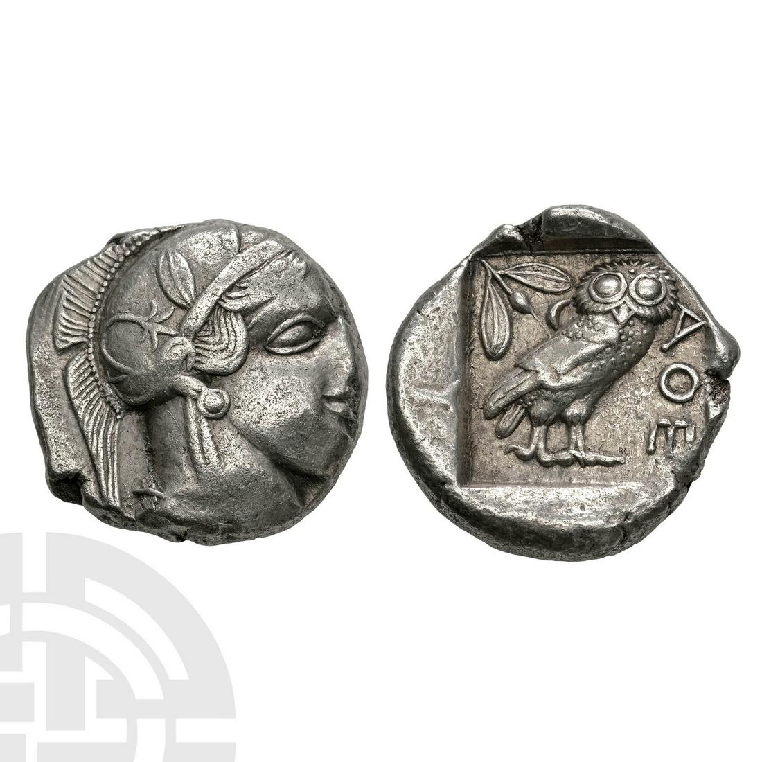 Attica - Athens - Owl Tetradrachm: 450-405 BC. Obv: helmetted head of Athena right. Rev: owl standing right; olive branch and crescent behind, A?E before, within incuse square. Sear 2526. 17.12 grams. Property of a London gentleman; fo
