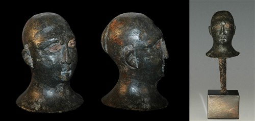 Celtic Iron Age - Romano British Bronze Head: Circa 1st century BC-1st century AD. A male bust with good facial detail, shaven head and pony tail; lead filled, with iron fixing spike. Size/Weight: 305 grams, 122 mm including stand. Size/Reference