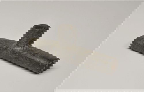 Prehistoric - North America - Stone Pipe: A grey, steatite straight-stemmed pipe with barrel-shaped bowl. Size/Weight: 315 grams, 165 mm. Size/Reference: Miles, C. Indian and Eskimo Artefacts of North America, p. 214. Size/Provenance: Ex Dr A