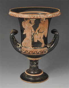 Southern Italian Red-Figure Calyx-Krater: Circa 4th century BC. A well-painted red figure ware krater with restrained use of white slip detailing; with ovolo motif encircling rim; wave pattern on the baseline; with long handles. Side A: a lib