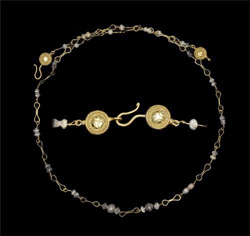 Roman Pearlescent Bead Gold Necklace: 1st-2nd century AD. A delicate necklace formed with fine (about 0.3mm) wire double-loop links and pearlescent globular beads; the catch a hook-and-eye with gold disc detailing; each disc with a triple