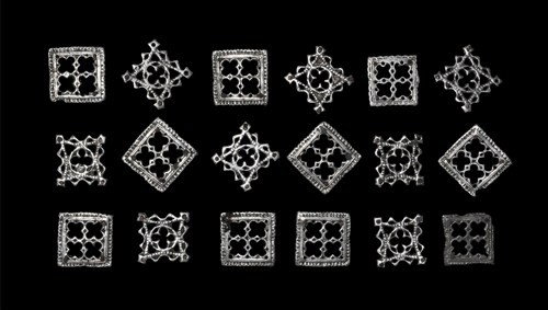 Byzantine Silver Sword Belt Mount Set: Circa 10th-11th century AD. Comprising eighteen cast silver elements of a belt mount set, each having four quatrefoil voids. Silver, 166 grams total, 32 - 35 mm each. Ex Coombe collection. 18
