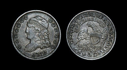 USA - 1832 - Liberty Cap Half Dime: Dated 1832. Obv: profile bust with 13 rosettes around and date below. Rev: eagle with 5c below and UNITED STATES OF AMERICA legend. 1.36 grams. K&M # 47.