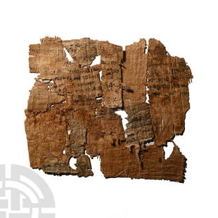 Egyptian Papyrus Fragment Collection: Ptolemaic to Roman Period, 4th century B.C.-4th century A.D. A group of fourteen papyrus fragments, most bearing remains of inked Demotic cursive script to one or both faces. 4.56 grams total,