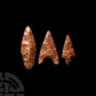 Egyptian Flint Arrowhead Collection: Pre Dynastic, 15,000-10,000 B.C. A group of three flint arrow heads comprising leaf-shaped, barbed and tanged examples. 62 grams total, 61-87 mm (2 3/8 - 3 3/8 in.) Found by a WWII soldier in the