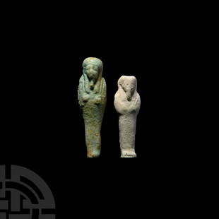 Egyptian Green Glazed Shabti Group: Ptolemaic Period, 332-30 B.C. A pair of composition blue-green glazed mummiform shabtis, each with crossed arms, wig and false beard; flat reverses. 26.5 grams total, 62-76 mm (2 1/2 - 3 in.)