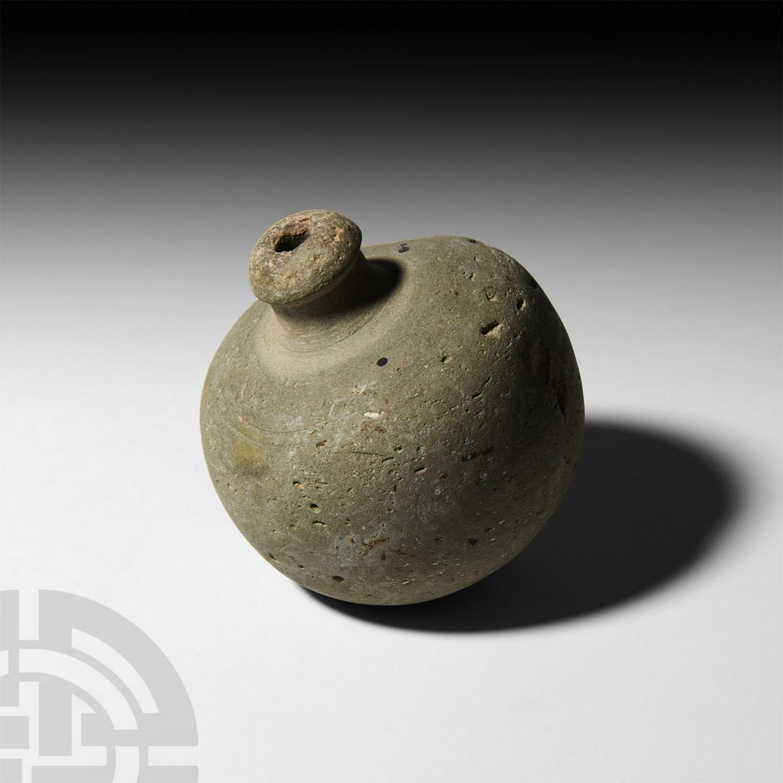 Byzantine 'Greek Fire' Fire Bomb or Hand Grenade: 9th-11th century A.D. A hollow ceramic vessel with rounded body, short neck and domed mouth; intended to be filled with explosive liquid and a wick, and used as a hand grenade. See Arendt, W. I., Gran