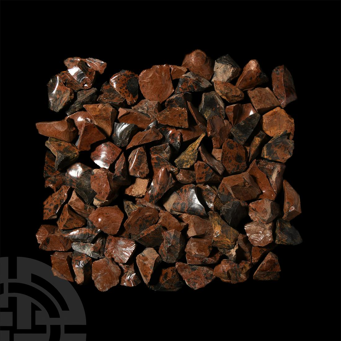 100 Brown Obsidian Mineral Specimens: A group of one hundred brown obsidian mineral specimens. 1 kg total, 30-47 mm (1 1/4 - 1 3/4 in.) Mineral Imports, London, UK. Gregory, Bottley & Lloyd (Gregory's). [100, No Reserve]