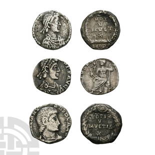 Clipped AR Siliquae Group [3]: 4th century A.D. Group comprising: issues of three emperors; one with Roma reverse and two wreath types (one Milan); legends generally clipped away. 2.90 grams total. Ex UK private collection. [3,